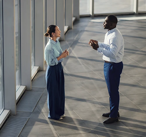 two persons talking